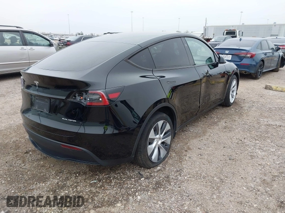 2023 Tesla Model Y Long Range z VIN 7SAYGDEEXPA181114, wystawiony jako IAAI lot #41564617 z przebiegiem 64 990 mil mil oraz . Historia ofert i sprzedaży dostępna na DreamBid. Obrazek 4.