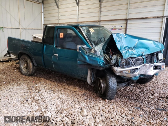 1997 Nissan Frontier XE with VIN 1N6SD16Y2VC338776, listed as a Copart auction lot 45020595 with 243,030 mi miles and Salvage title. Bid and sale history available at DreamBid. Image 4.