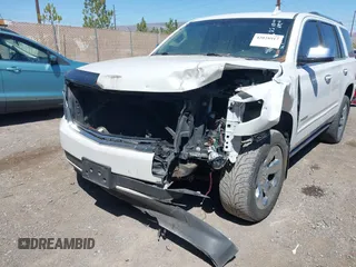 2016 Chevrolet Tahoe LTZ z VIN 1GNSKCKC8GR451685, wystawiony jako IAAI lot #42028917 z przebiegiem 73 398 mil mil oraz . Historia ofert i sprzedaży dostępna na DreamBid. Obrazek 6.