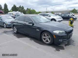 2012 BMW 5 Series 528i with VIN WBAXG5C55CDX02405, listed as a IAAI auction lot 42127069 with 155,764 mi miles. Bid and sale history available at carsss.com. Image 1.