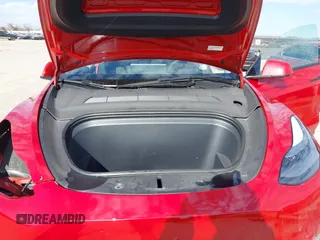 2023 Tesla Model Y Long Range with VIN 7SAYGDEE5PA198483, listed as a IAAI auction lot 41433952 with 24,753 mi miles and . Bid and sale history available at DreamBid. Image 10.