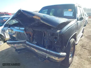 1996 Chevrolet Tahoe with VIN 1GNEK13RXTJ418622, listed as a IAAI auction lot 41879760 with 349,211 mi miles. Bid and sale history available at carsss.com. Image 6.