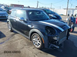 2014 MINI Hardtop S with VIN WMWXM7C59ET970371, listed as a IAAI auction lot 41643992 with 123,813 mi miles and . Bid and sale history available at DreamBid. Image 1.