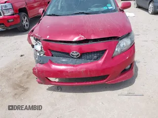 2009 Toyota Corolla with VIN 1NXBU40E19Z161524, listed as a IAAI auction lot 42068238 with 137,019 mi miles. Bid and sale history available at carsss.com. Image 6.