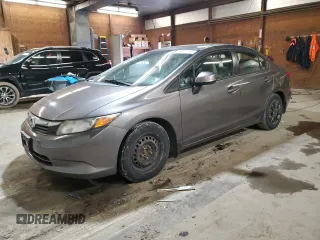 2012 Honda Civic LX z VIN 19XFB2F51CE392095, wystawiony jako Copart lot #56037015 z przebiegiem 131 566 mil mil oraz Szkoda całkowita • Salvage title. Historia ofert i sprzedaży dostępna na DreamBid. Obrazek 1.