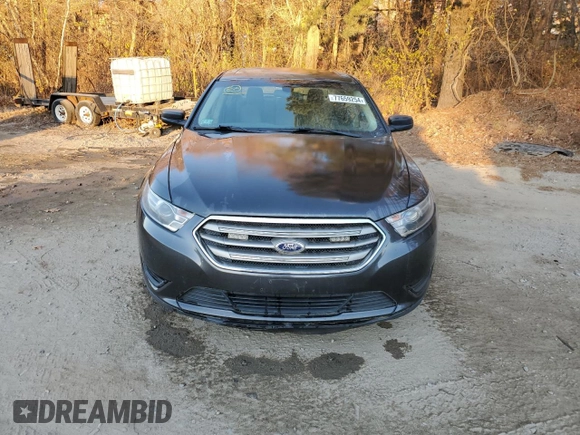 2015 Ford Taurus SE with VIN 1FAHP2D86FG184747, listed as a Copart auction lot 77659254 with 140,404 mi miles and Clean Title. Bid and sale history available at carsss.com. Image 5.
