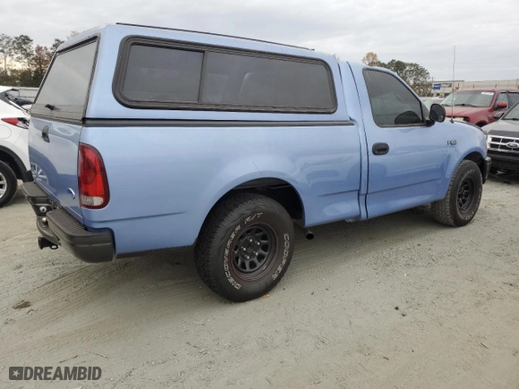 1997 Ford F-150 Standard with VIN 1FTDF1721VNC60947, listed as a Copart auction lot 77419524 with 28,696 mi miles and Salvage Title. Bid and sale history available at carsss.com. Image 3.