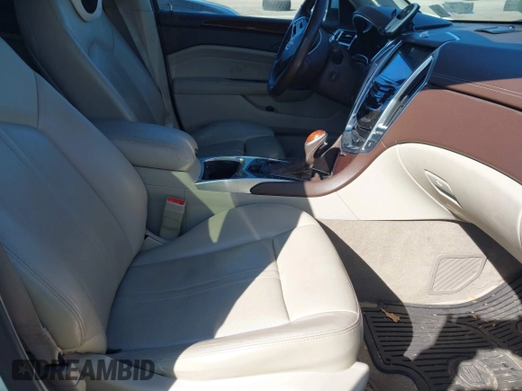 2015 Cadillac SRX Performance Collection with VIN 3GYFNFE35FS573814, listed as a IAAI auction lot 41770696 with 119,205 mi miles and . Bid and sale history available at DreamBid. Image 5.