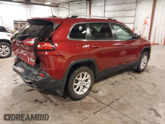 2016 Jeep Cherokee Latitude with VIN 1C4PJMCS2GW131065, listed as a IAAI auction lot 42296276 with 145,587 mi miles and . Bid and sale history available at DreamBid. Image 4.