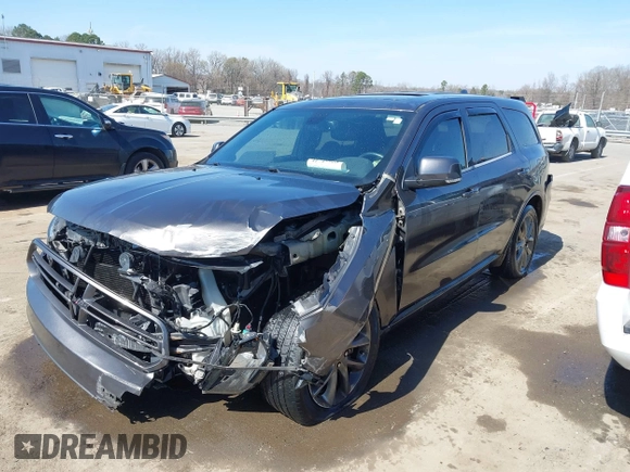 2015 Dodge Durango R/T with VIN 1C4SDHCT3FC771271, listed as a IAAI auction lot 41749928 with 145,555 mi miles and . Bid and sale history available at carsss.com. Image 2.