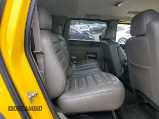2003 Hummer H2 z VIN 5GRGN23U73H146894, wystawiony jako Copart lot #53449905 z przebiegiem 153 870 mil mil oraz Szkoda całkowita • Salvage title. Historia ofert i sprzedaży dostępna na DreamBid. Obrazek 11.
