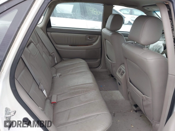 2004 Toyota Avalon XL with VIN 4T1BF28B84U384211, listed as a IAAI auction lot 41925260 with 122,669 mi miles and . Bid and sale history available at DreamBid. Image 8.