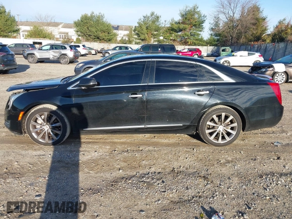 2013 Cadillac XTS z VIN 2G61N5S32D9238652, wystawiony jako IAAI lot #40966692 z przebiegiem 90 834 mil mil oraz . Historia ofert i sprzedaży dostępna na DreamBid. Obrazek 14.