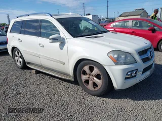 2011 Mercedes-Benz GL-Class GL 450 with VIN 4JGBF7BE0BA646690, listed as a IAAI auction lot 42204394 with 174,134 mi miles. Bid and sale history available at carsss.com. Image 1.