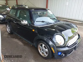 2010 MINI Hardtop with VIN WMWMF3C53ATZ66316, listed as a IAAI auction lot 42142901 with 57,510 mi miles and . Bid and sale history available at DreamBid. Image 1.