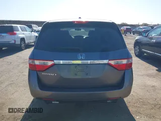 2012 Honda Odyssey EX-L with VIN 5FNRL5H6XCB061026, listed as a IAAI auction lot 42574612 with 144,480 mi miles and . Bid and sale history available at DreamBid. Image 16.