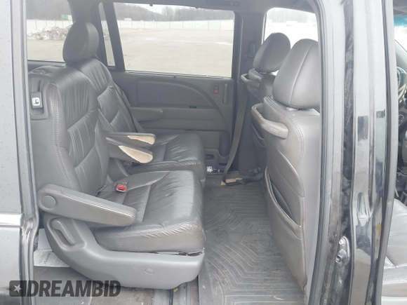 2010 Honda Odyssey EX-L with VIN 5FNRL3H73AB078714, listed as a IAAI auction lot 41520151 with 218,466 mi miles and . Bid and sale history available at DreamBid. Image 8.