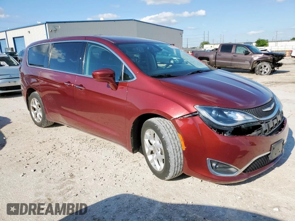 2018 Chrysler Pacifica Touring Plus with VIN 2C4RC1FG3JR125624, listed as a Copart auction lot 55962635 with 99,806 mi miles and Salvage title. Bid and sale history available at DreamBid. Image 4.