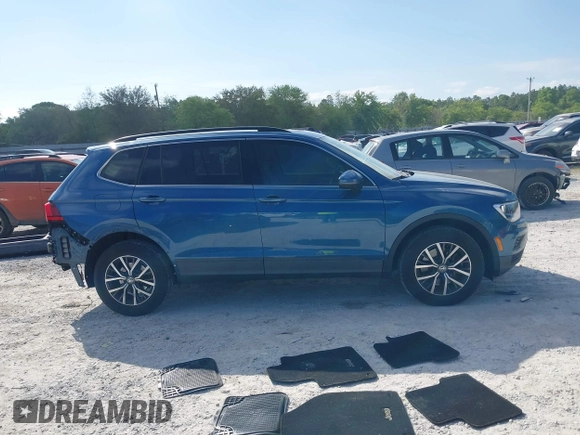 2019 Volkswagen Tiguan SE with VIN 3VV3B7AX2KM006055, listed as a IAAI auction lot 42023713 with 83,570 mi miles and . Bid and sale history available at DreamBid. Image 14.