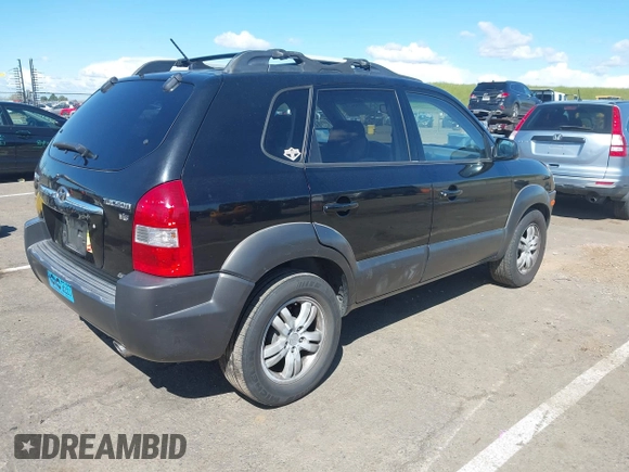 2007 Hyundai Tucson SE with VIN KM8JN72D47U629516, listed as a IAAI auction lot 41956757 with 190,852 mi miles and . Bid and sale history available at DreamBid. Image 4.