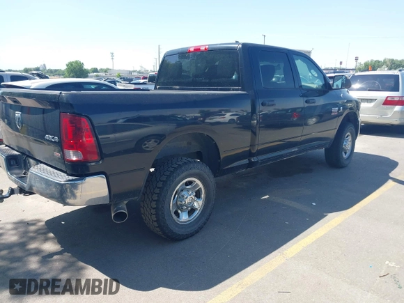 2012 Ram 2500 ST z VIN 3C6UD5CL2CG291018, wystawiony jako IAAI lot #42573010 z przebiegiem Nie podano mil oraz . Historia ofert i sprzedaży dostępna na DreamBid. Obrazek 4.