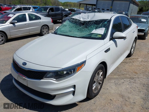 2016 Kia Optima LX z VIN 5XXGT4L3XGG080662, wystawiony jako IAAI lot #42048361 z przebiegiem 99 564 mil mil oraz . Historia ofert i sprzedaży dostępna na DreamBid. Obrazek 6.
