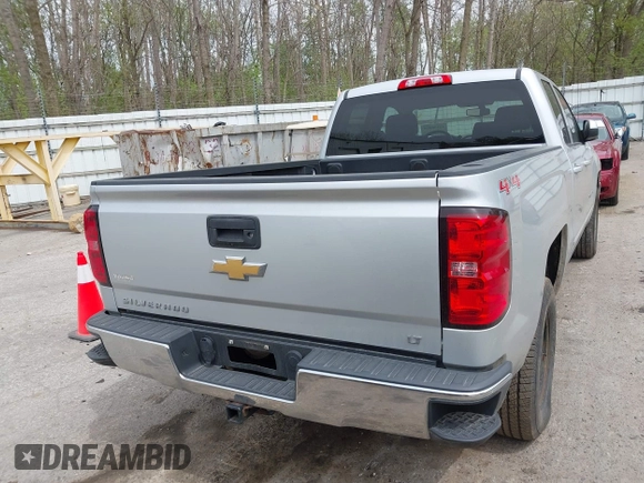 2016 Chevrolet Silverado 1500 LT with VIN 1GCVKREC1GZ228201, listed as a IAAI auction lot 42136420 with 112,101 mi miles and . Bid and sale history available at DreamBid. Image 16.
