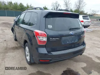 2014 Subaru Forester 2.5i Limited with VIN JF2SJAJC1EH517094, listed as a IAAI auction lot 41953103 with 145,122 mi miles. Bid and sale history available at carsss.com. Image 3.