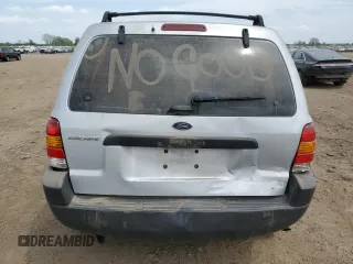 2004 Ford Escape XLS с VIN 1FMYU02134KA88982, выставлен на аукционе Copart как лот 57037915 с пробегом 195 423 миль миль и Списание • Salvage title. История ставок и продаж доступна на DreamBid. Изображение 6.