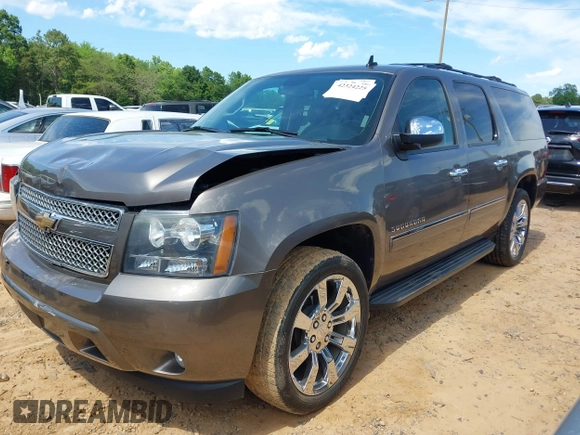 2011 Chevrolet Suburban LTZ with VIN 1GNSKKE3XBR394436, listed as a IAAI auction lot 42324225 with 132,871 mi miles and . Bid and sale history available at DreamBid. Image 17.