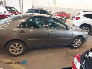 2005 Toyota Camry LE with VIN 4T1BF30K15U591137, listed as a IAAI auction lot 41681990 with 231,555 mi miles and . Bid and sale history available at DreamBid. Image 13.