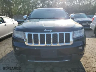 2012 Jeep Grand Cherokee Overland with VIN 1C4RJFCG4CC292383, listed as a Copart auction lot 51168385 with 132,697 mi miles and Salvage Title. Bid and sale history available at carsss.com. Image 5.