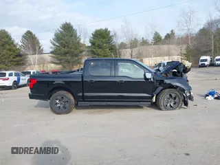 2022 Ford F-150 Lightning Pro z VIN 1FT6W1EV3NWG03970, wystawiony jako IAAI lot #41801986 z przebiegiem 29 815 mil mil oraz . Historia ofert i sprzedaży dostępna na DreamBid. Obrazek 13.