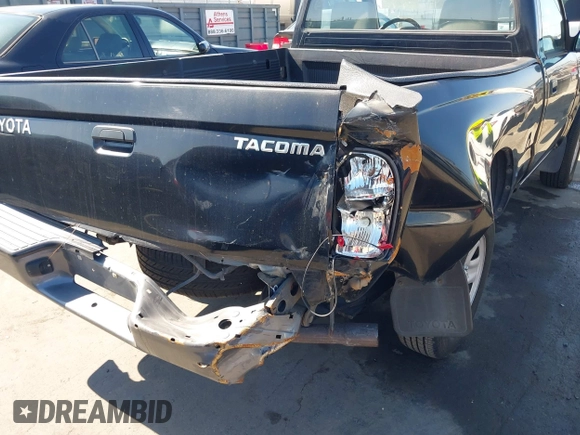 2003 Toyota Tacoma with VIN 5TENL42N33Z180883, listed as a IAAI auction lot 41676416 with 132,996 mi miles and . Bid and sale history available at DreamBid. Image 6.