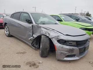 2018 Dodge Charger R/T with VIN 2C3CDXCTXJH148030, listed as a IAAI auction lot 41225873 with 105,069 mi miles. Bid and sale history available at carsss.com. Image 1.