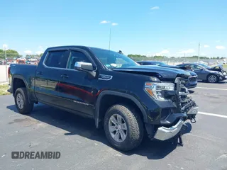2019 GMC Sierra 1500 SLE with VIN 1GTU9BED1KZ399174, listed as a IAAI auction lot 42523800 with 118,003 mi miles and . Bid and sale history available at DreamBid. Image 1.