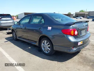 2009 Toyota Corolla with VIN 1NXBU40E69Z034459, listed as a IAAI auction lot 42095649 with 173,296 mi miles. Bid and sale history available at carsss.com. Image 3.