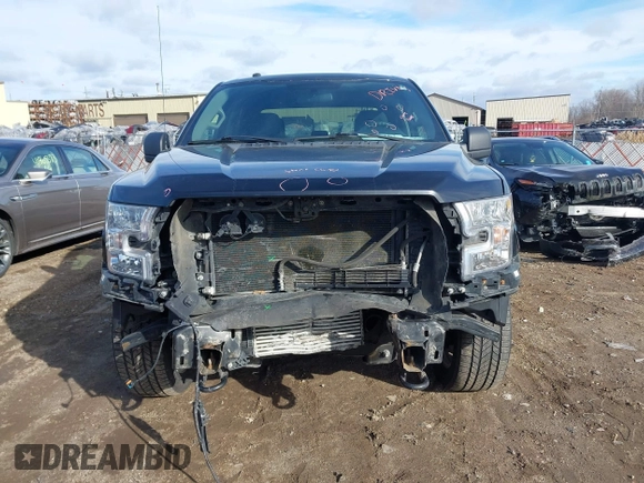 2017 Ford F-150 XL with VIN 1FTEW1EP7HFB65004, listed as a IAAI auction lot 41876164 with 105,487 mi miles. Bid and sale history available at carsss.com. Image 12.