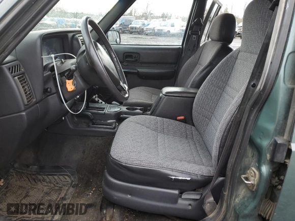 2000 Jeep Cherokee Classic with VIN 1J4FF58S3YL104384, listed as a Copart auction lot 46645415 with 253,730 mi miles and Salvage Title. Bid and sale history available at carsss.com. Image 7.