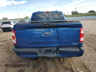 2023 Ford F-150 XL with VIN 1FTEW1EP8PKE04419, listed as a Copart auction lot 60843835 with 31,684 mi miles and Salvage title. Bid and sale history available at DreamBid. Image 6.