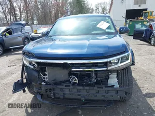 2023 Volkswagen Atlas SE with VIN 1V2HR2CA2PC505456, listed as a IAAI auction lot 42032269 with 7,918 mi miles and . Bid and sale history available at DreamBid. Image 6.