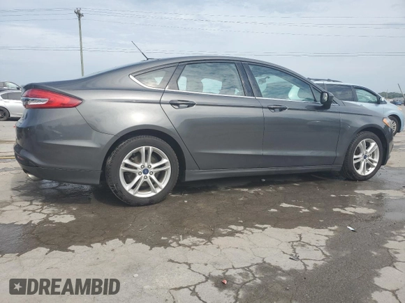 2018 Ford Fusion SE с VIN 3FA6P0HD3JR231639, выставлен на аукционе Copart как лот 59798395 с пробегом 121 368 миль миль и Списание • Salvage title. История ставок и продаж доступна на DreamBid. Изображение 3.
