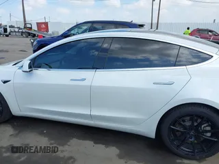 2020 Tesla Model 3 Long Range with VIN 5YJ3E1EB9LF795246, listed as a IAAI auction lot 41895750 with 163,061 mi miles and . Bid and sale history available at DreamBid. Image 15.