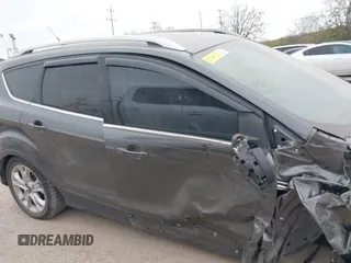 2016 Ford Escape Titanium with VIN 1FMCU0J9XGUC58149, listed as a IAAI auction lot 41739005 with 111,594 mi miles. Bid and sale history available at carsss.com. Image 12.
