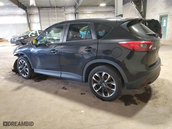 2016 Mazda CX-5 Grand Touring with VIN JM3KE4DY6G0725413, listed as a Copart auction lot 51985445 with 177,633 mi miles and Salvage Title. Bid and sale history available at carsss.com. Image 2.
