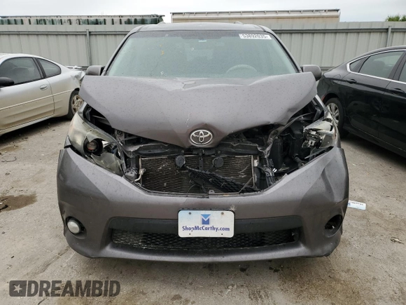 2014 Toyota Sienna SE с VIN 5TDXK3DC1ES519741, выставлен на аукционе Copart как лот 53892035 с пробегом Не указан миль и Списание • Salvage title. История ставок и продаж доступна на DreamBid. Изображение 5.