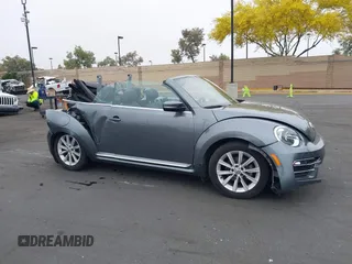 2018 Volkswagen Beetle S z VIN 3VW5DAAT3JM506023, wystawiony jako IAAI lot #42414886 z przebiegiem 33 424 mil mil oraz . Historia ofert i sprzedaży dostępna na DreamBid. Obrazek 14.