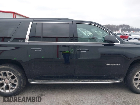 2015 GMC Yukon XL SLT with VIN 1GKS2HKC6FR746809, listed as a IAAI auction lot 41559570 with 144,401 mi miles. Bid and sale history available at carsss.com. Image 14.