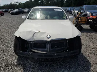 2007 BMW 3 Series 328i with VIN WBAVA33507PV66301, listed as a Copart auction lot 52763635 with 168,598 mi miles and Clean Title. Bid and sale history available at DreamBid. Image 5.