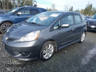 2011 Honda Fit Sport z VIN JHMGE8H54BC000162, wystawiony jako IAAI lot #41665321 z przebiegiem 154 531 mil mil oraz . Historia ofert i sprzedaży dostępna na DreamBid. Obrazek 2.